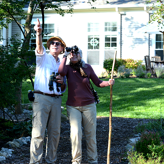 two people bird watching