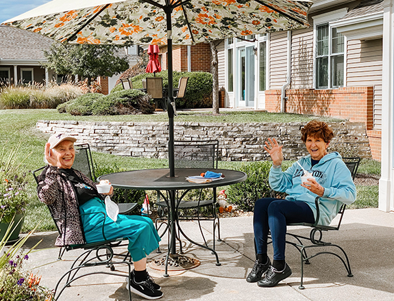 two people on a porch