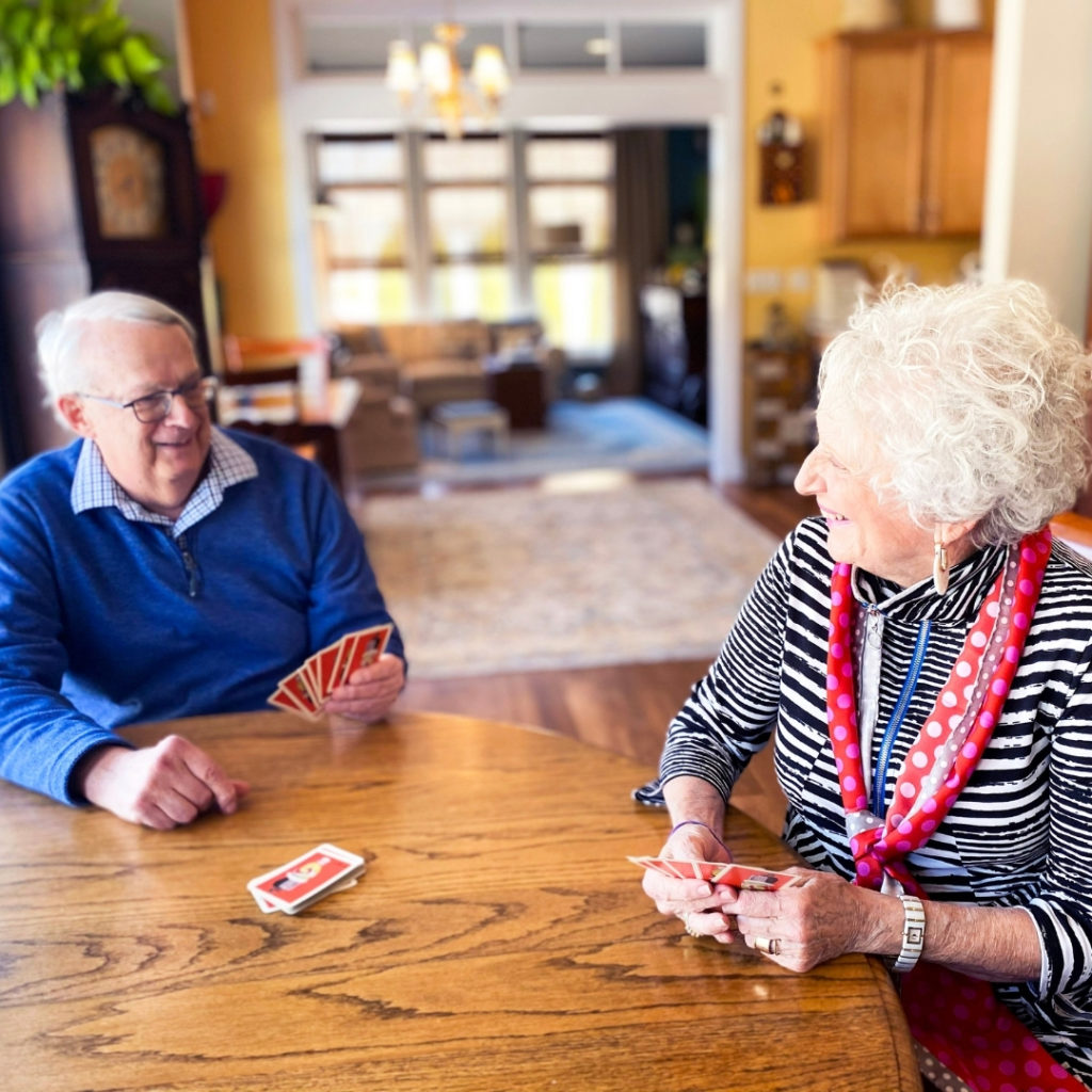 two people playing cards